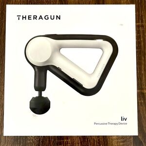 Theragun Liv, White. One attachment.